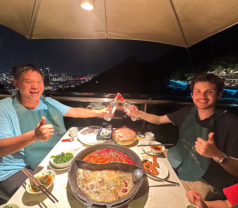 foreigners eating hot pot